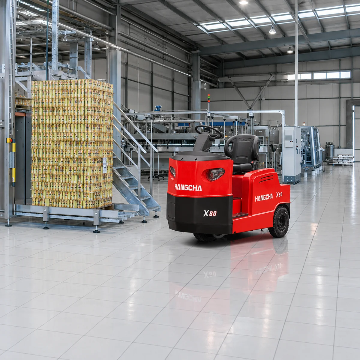 Hangcha X80 electric tow tractor on bright factory floor near packaged pallet load