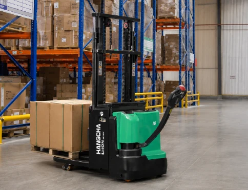 Hangcha X Series initial-lift pallet stacker with 1.2-1.6 t capacity, moving a pallet in a warehouse aisle