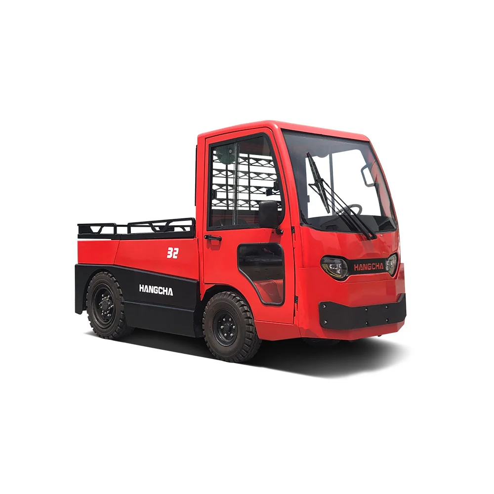 Hangcha X32 electric tow tractor with rear cargo tray, opposite front three-quarter view
