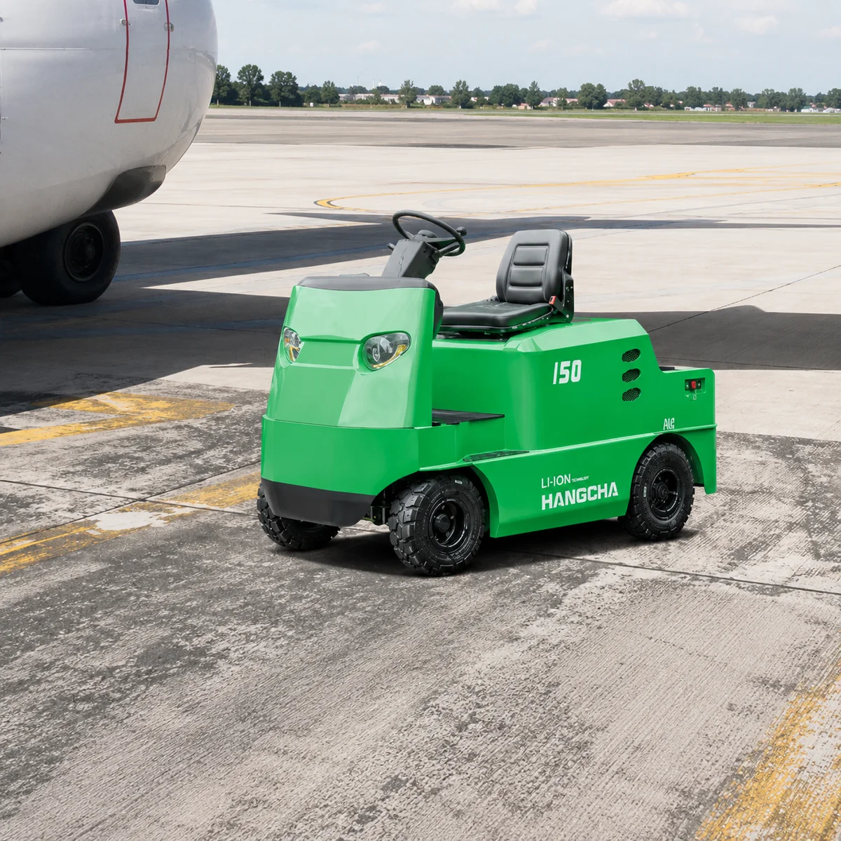 Hangcha X Series electric tow tractor driving on an airport apron near an aircraft