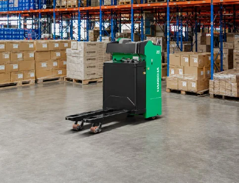 Hangcha XA Series stand-on side-seated pallet truck 2t moving cartons in a warehouse